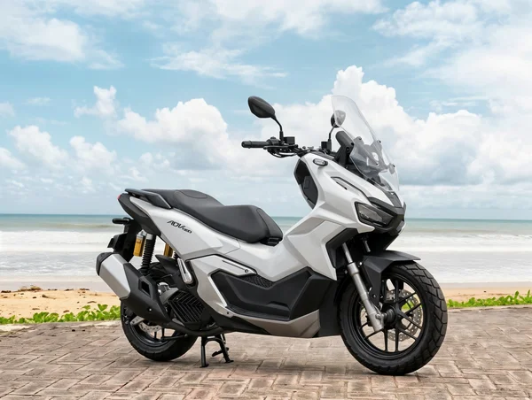 Honda ADV160 automatic adventure-style scooter with tall windscreen, raised stance and broad stepped seat