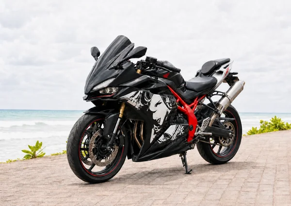 Black and red Honda CBR250RR ABS parallel-twin sport bike with full fairings and raised tail