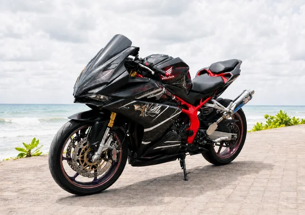 Honda CBR250RR Kabuki Limited Edition with black Kabuki artwork, red frame and red wheel accents