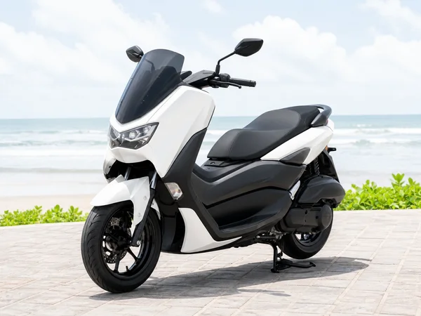 First-generation Yamaha NMAX155 road scooter with windscreen, broad body and wide two-level seat
