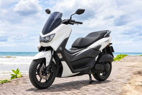 White Yamaha NMAX155, front three-quarter view