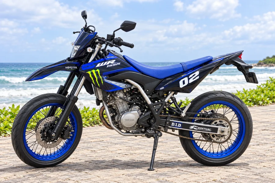 Blue Yamaha WR155R with supermoto road wheels, front three-quarter view